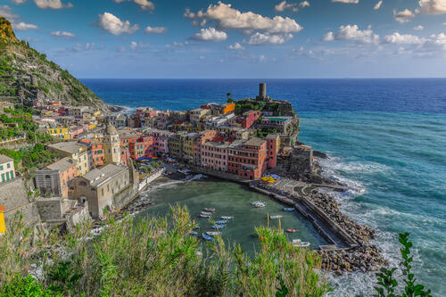 The sea bay by the cliff houses in Italy