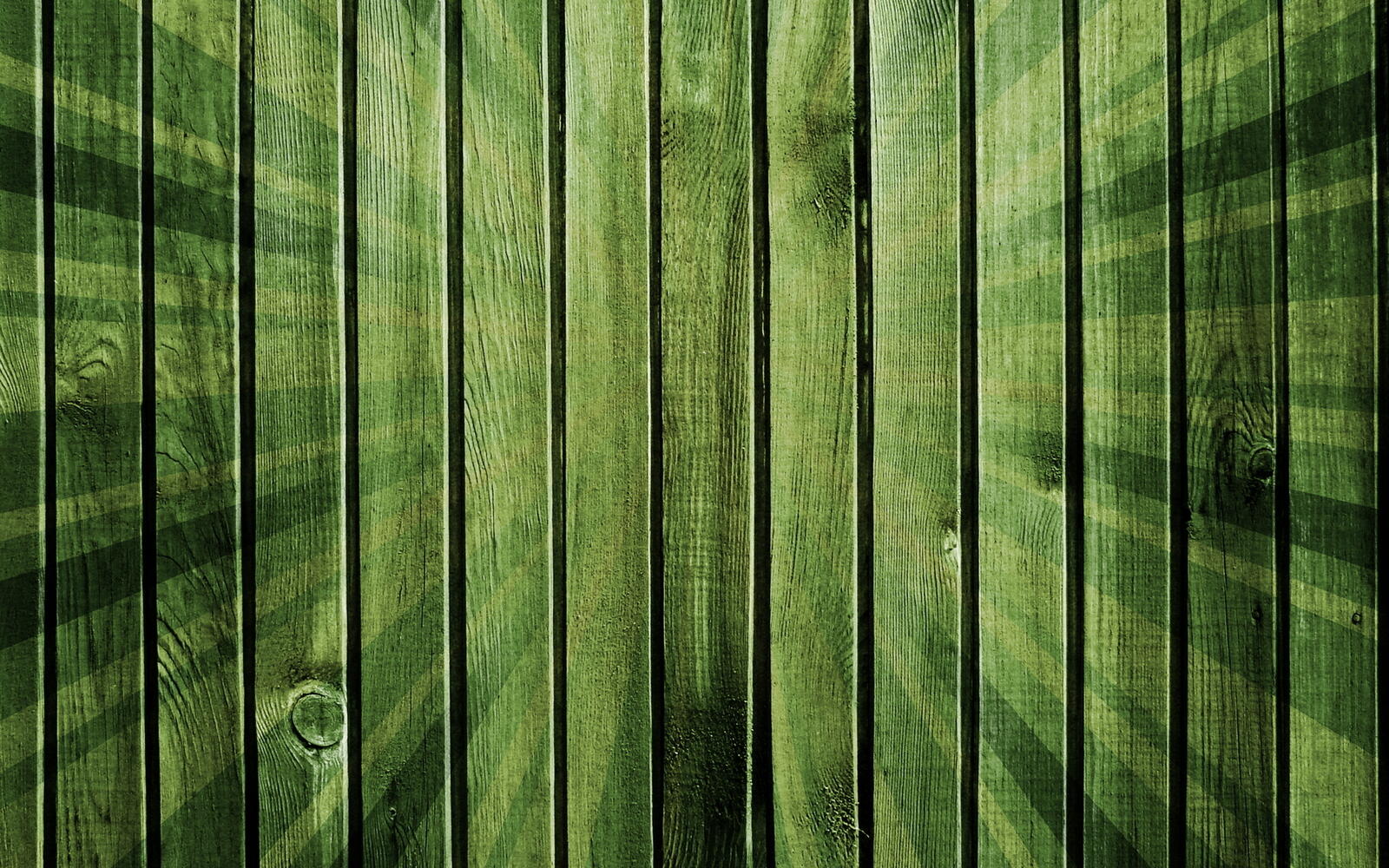Free photo Green fence made of wooden planks