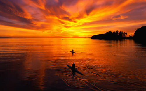 A fiery sunset on the lake