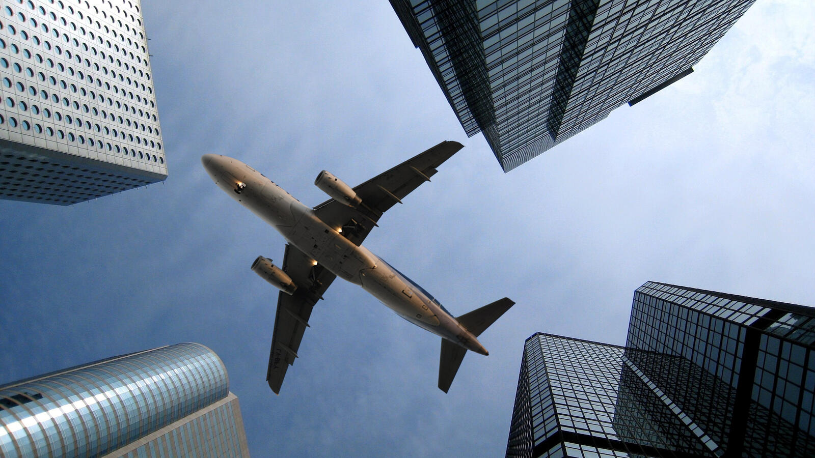 Wallpapers skyscrapers aircraft wings on the desktop