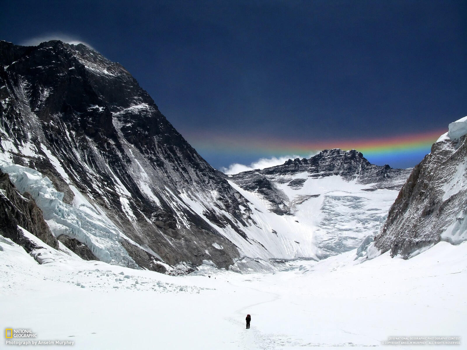 snow rainbow mountains
