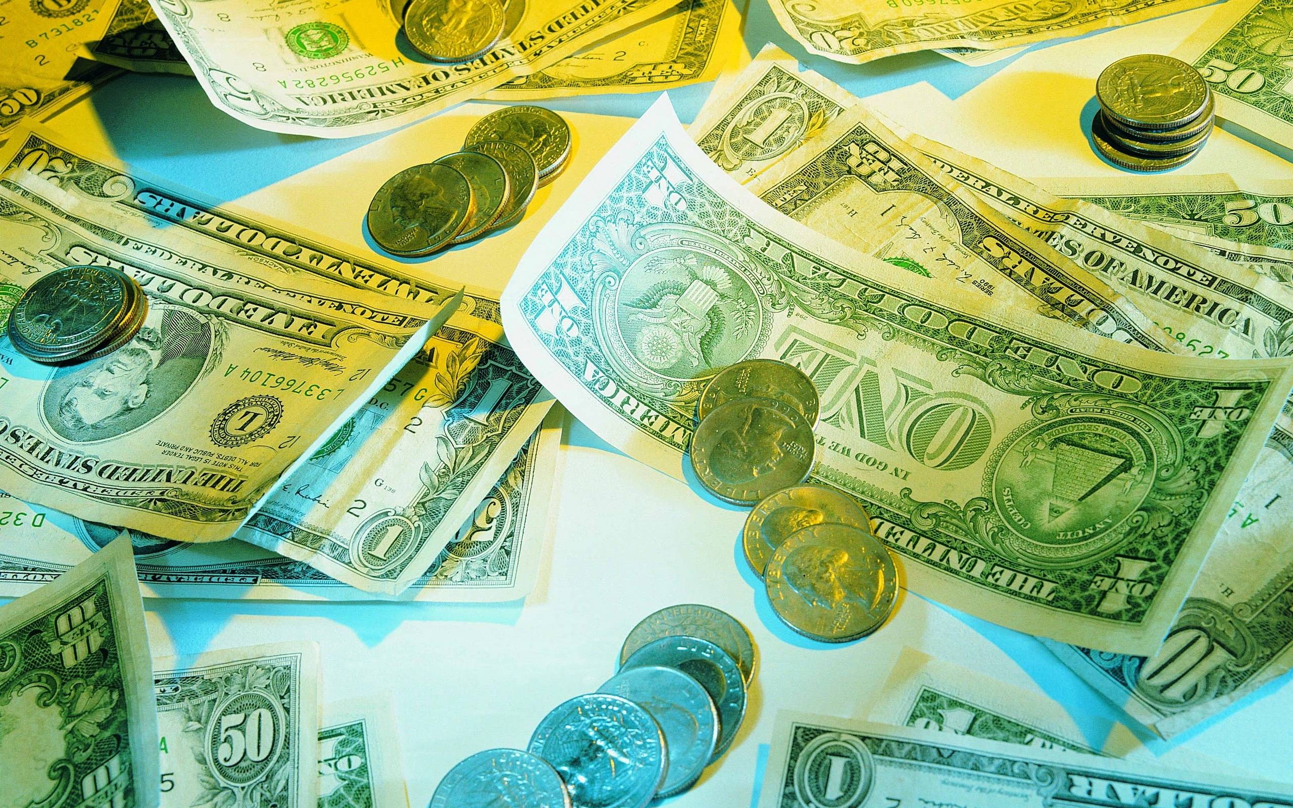 Wallpapers bills dollars coins on the desktop