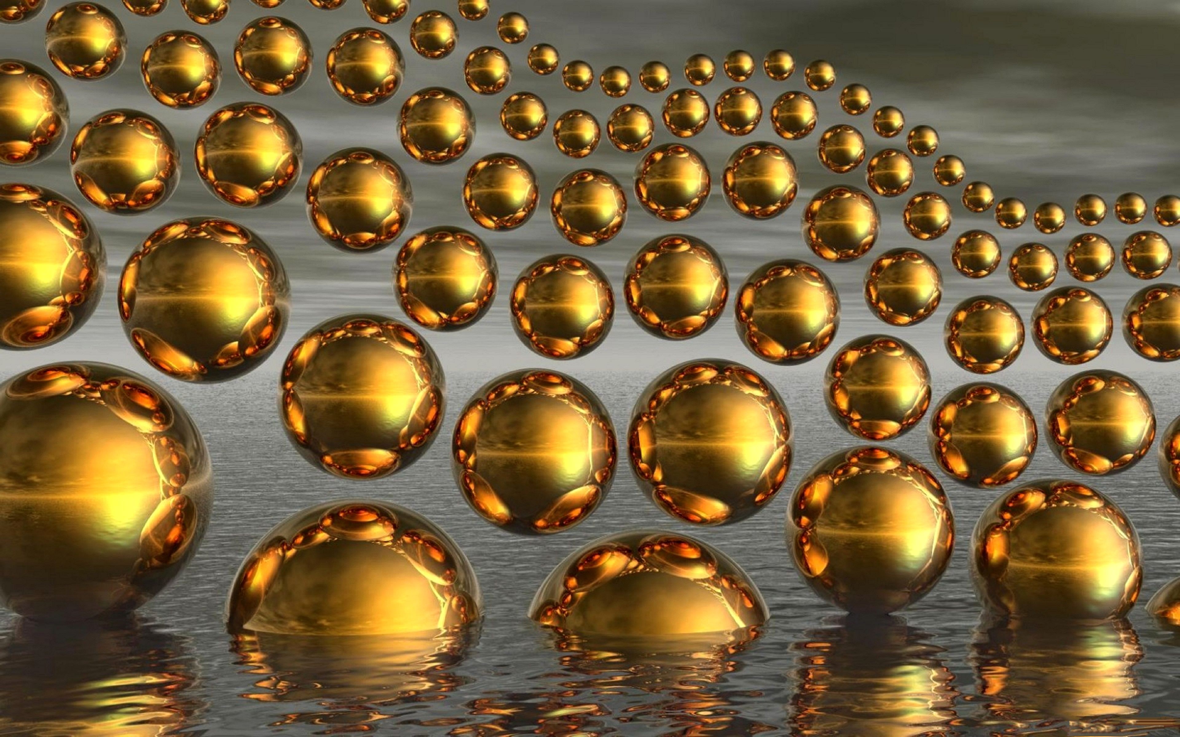 Wallpapers balls gold water on the desktop