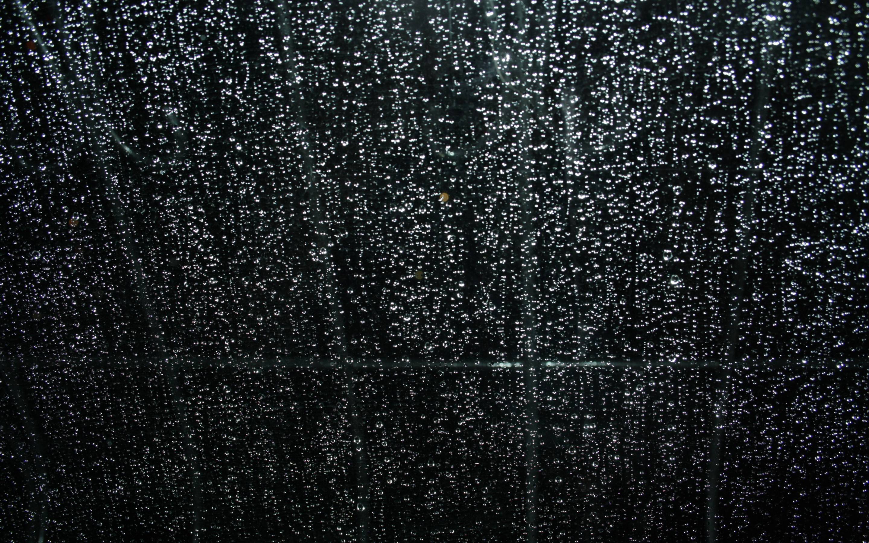 Wallpapers rain drops on glass black background close-up on the desktop