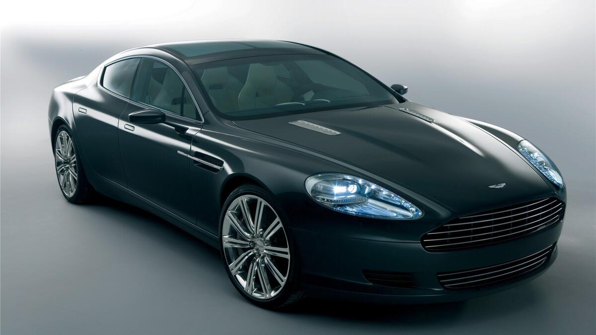 Aston martin black on a plain background