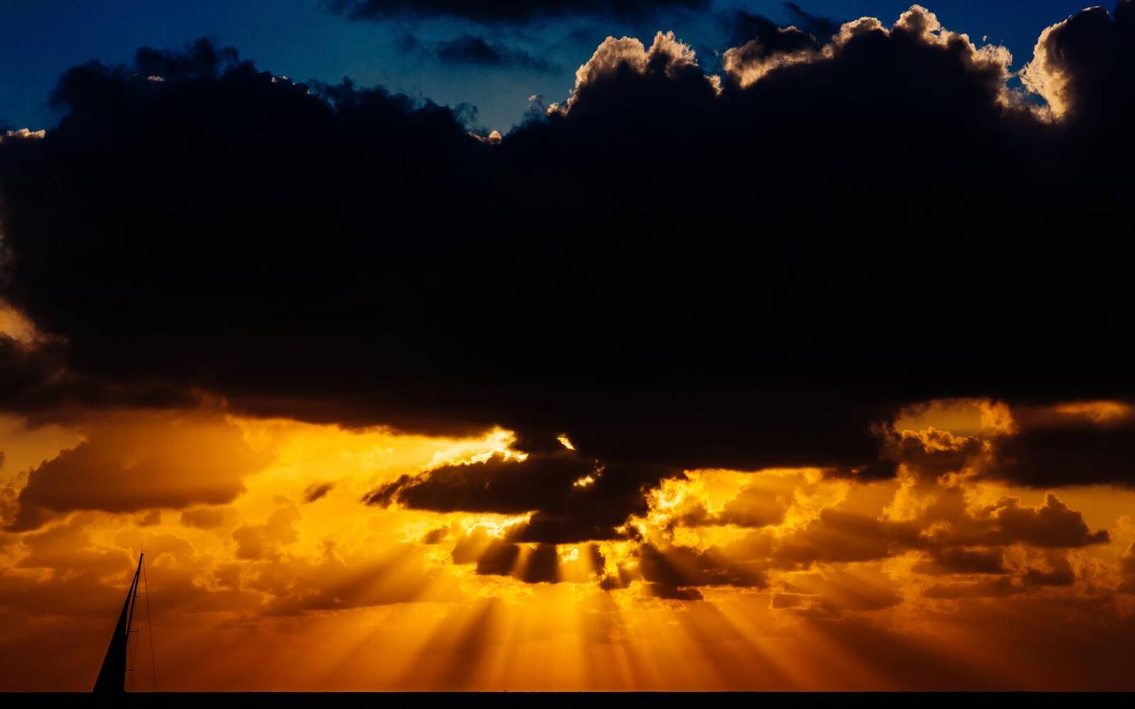 Wallpapers black clouds sunset rays on the desktop